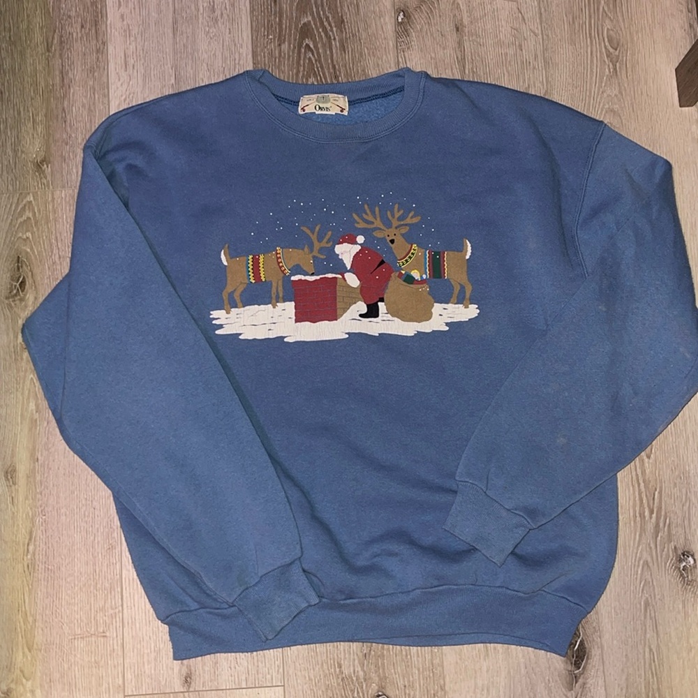 Light blue Christmas sweater with small stains